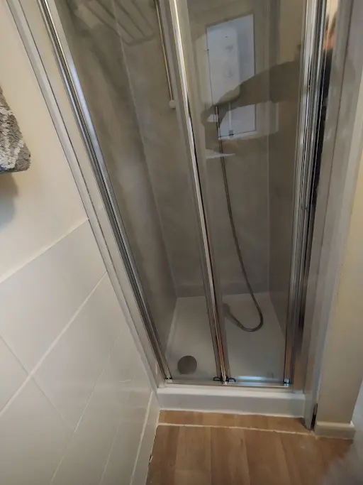 Shower enclosure installation